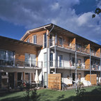 Mehrfamilienhaus in Grünwald als Holzsystembau von SÄBU Holzbau - Gartenseite 